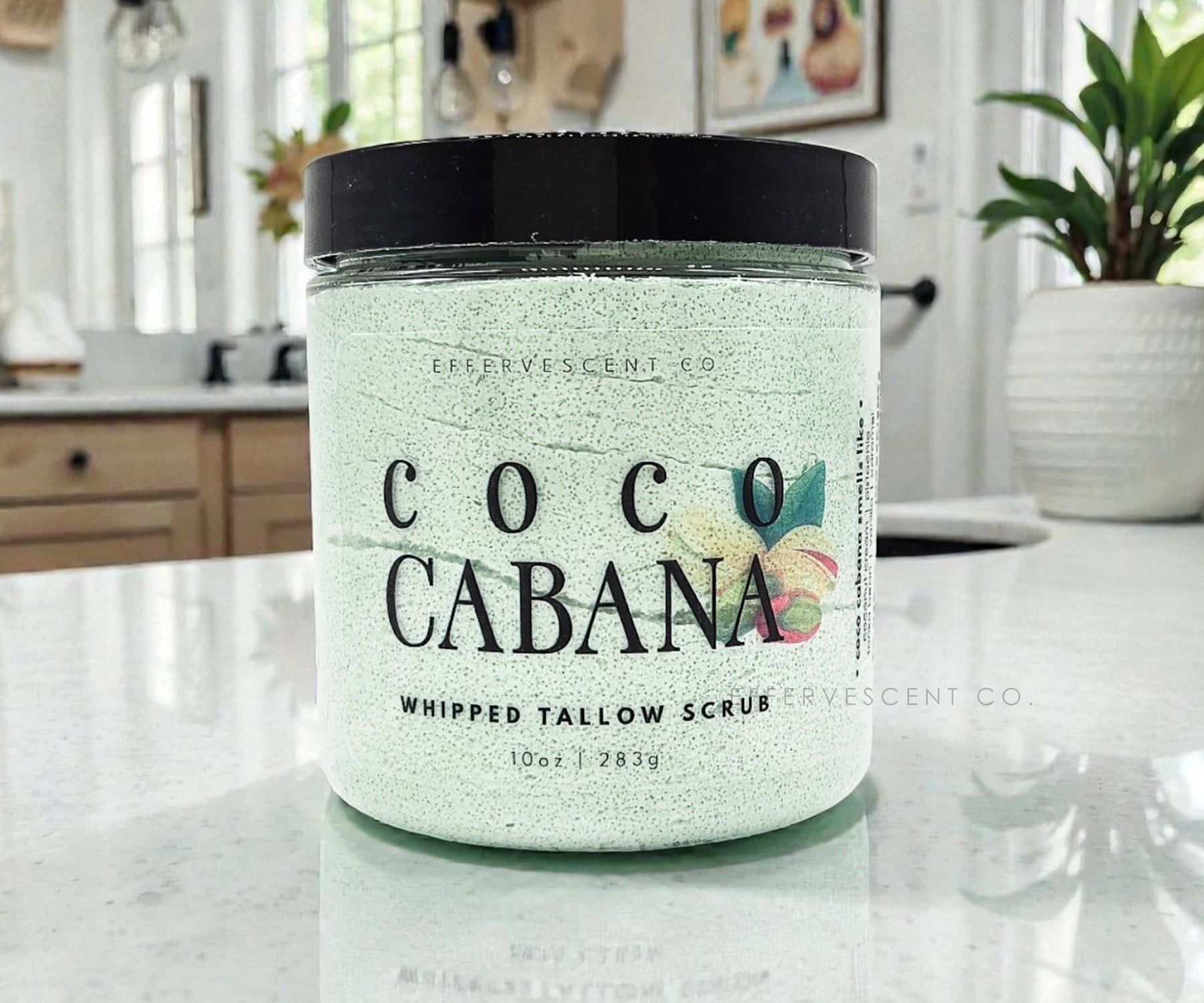 Jar of 'Coco Cabana' whipped tallow scrub on a kitchen counter