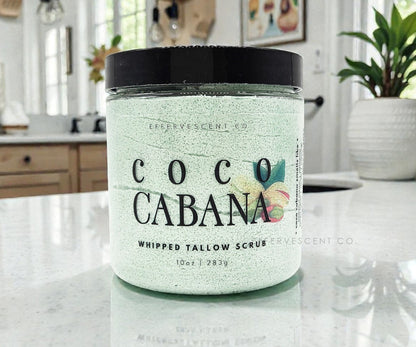 Jar of 'Coco Cabana' whipped tallow scrub on a kitchen counter